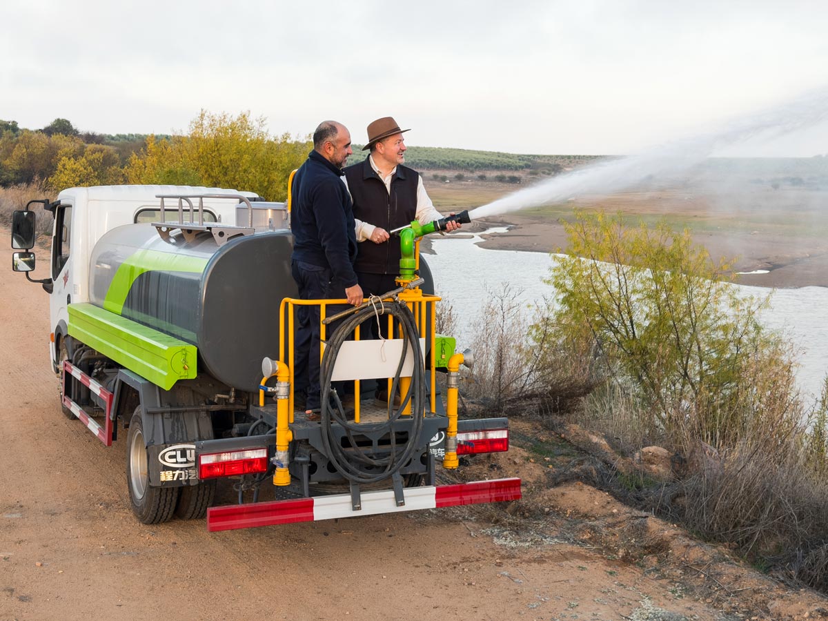 T. J. Robinson testing out the firetruck's capabilities with Juan Carlos of Agrícola Pobeña in Chile