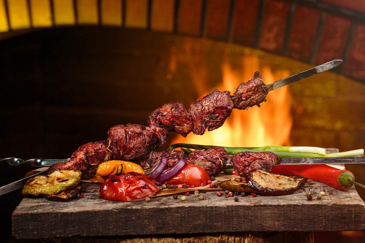 Lamb kebabs and mixed vegetables