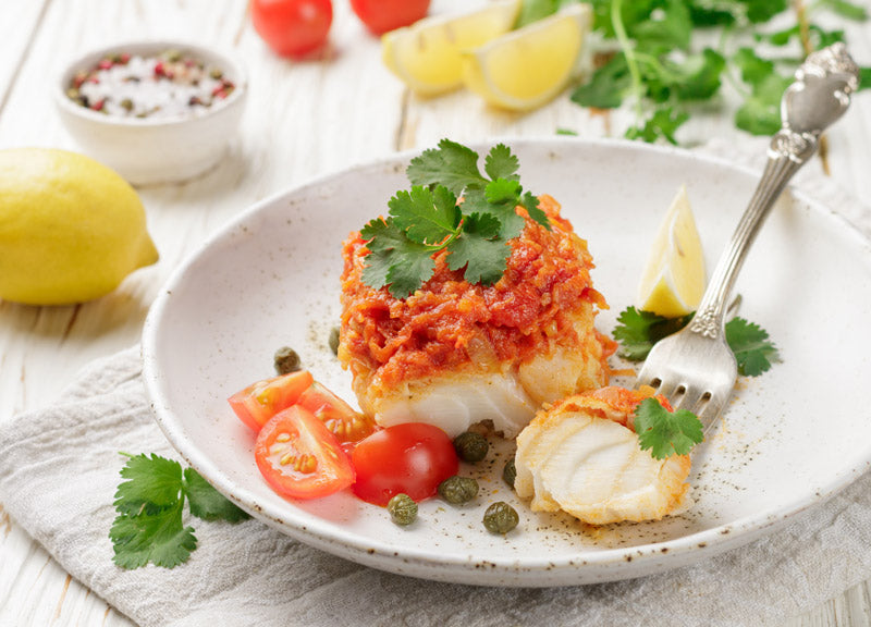 Monkfish with tomato and garlic sauce