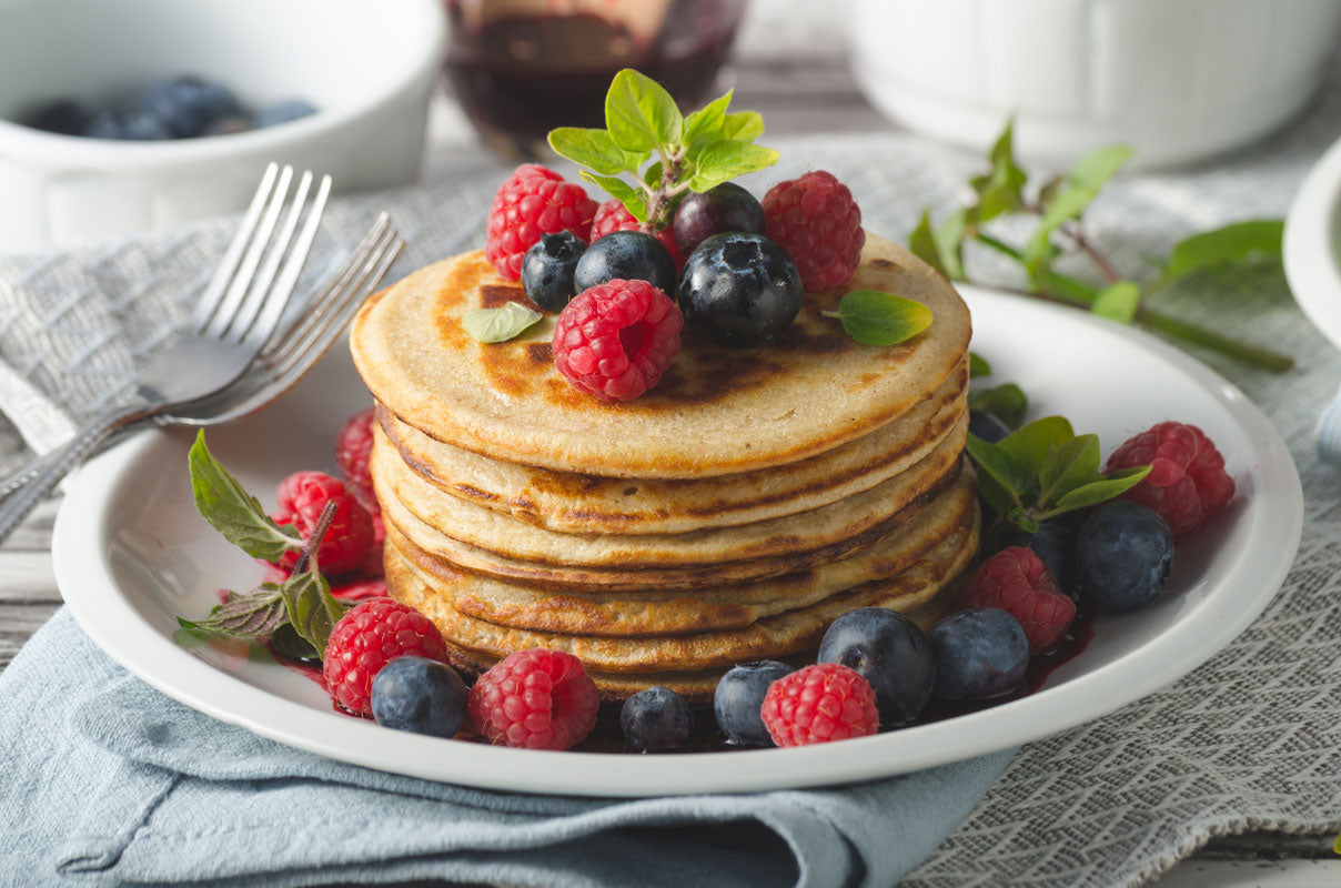 Olive oil and lemon pancakes with fresh berries