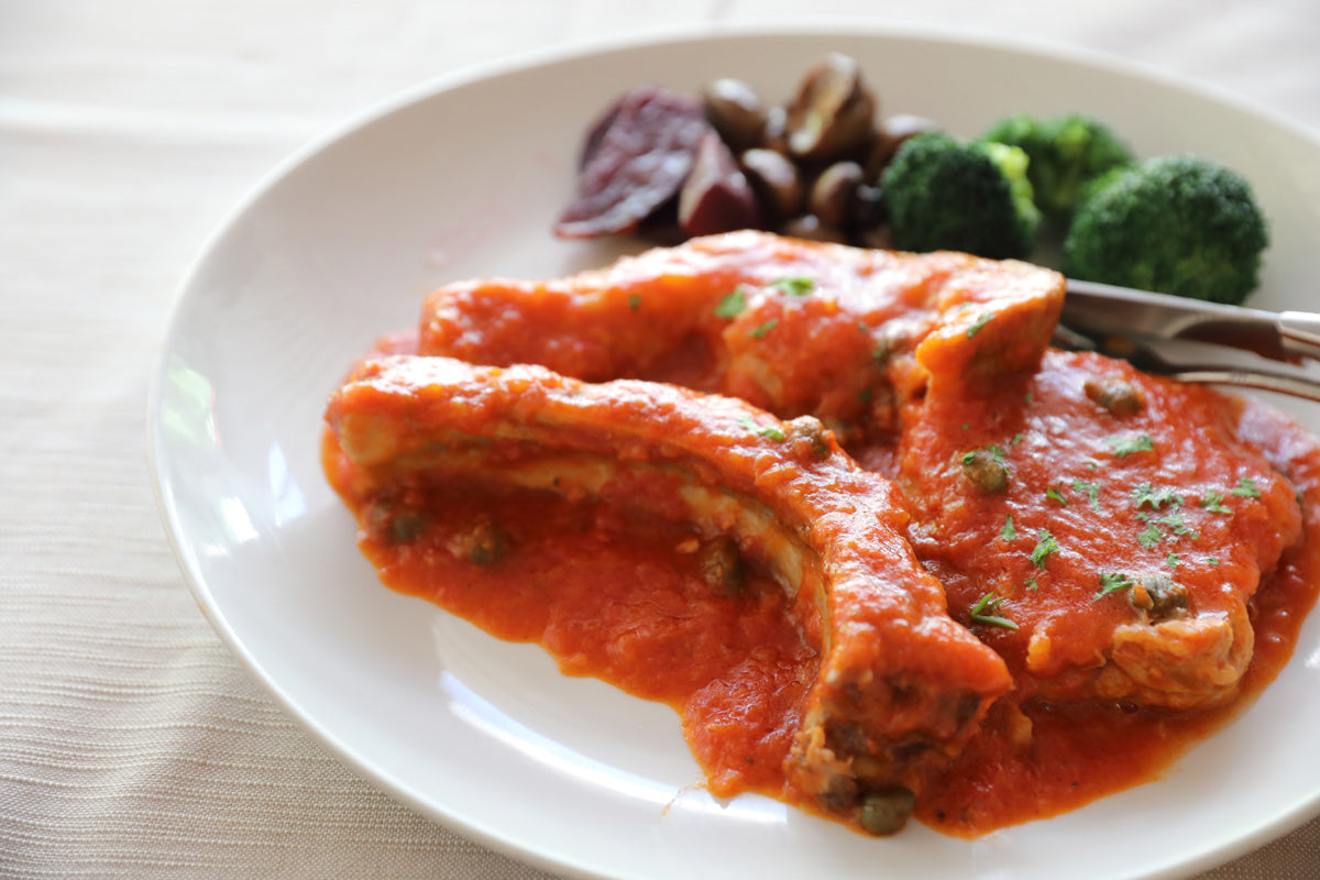 Pork chops with tomatoes and capers