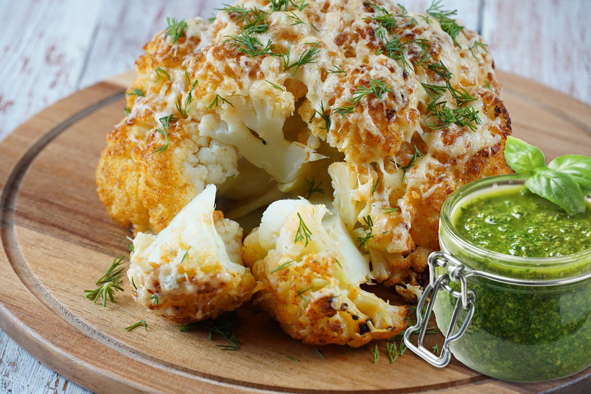 Whole Roasted Cauliflower with Pea Pesto