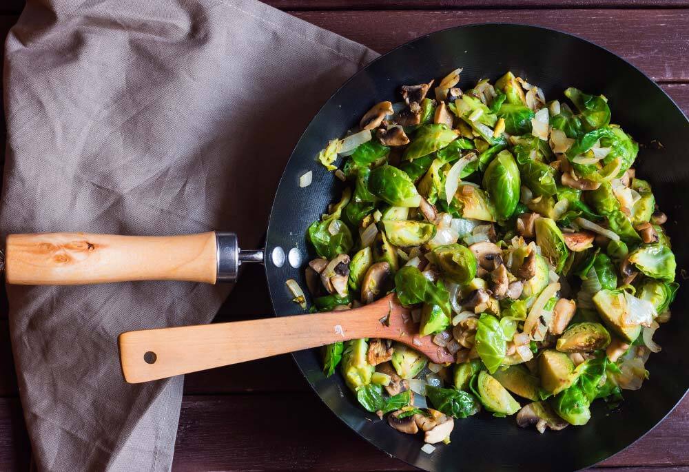 Roasted Brussels Sprouts and Onions with Mushroom Lardons