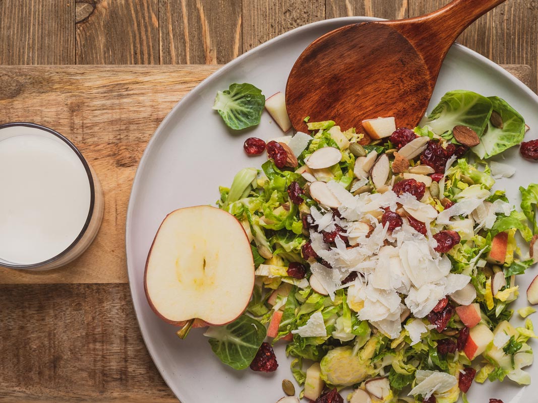 Shaved Brussels Sprout Salad with Fruit and Nuts