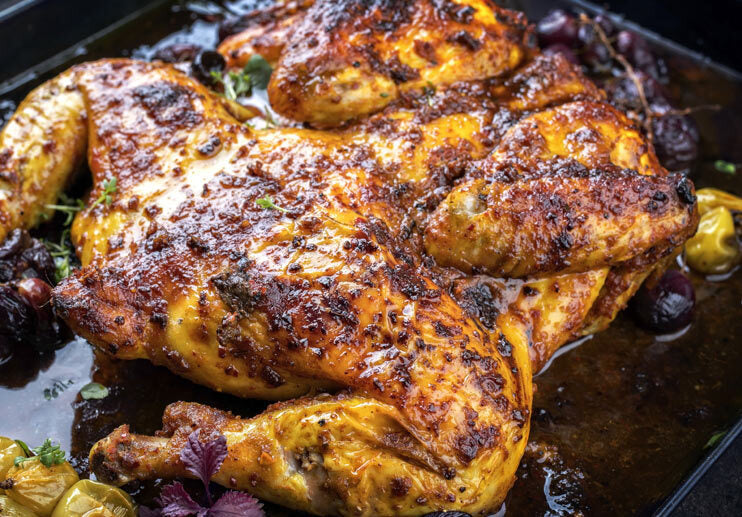 Spatchcocked Chicken with Cracked Olives and Herbs